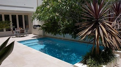 swimming pool landscape plantings used for shade by LAND ART Landscape Architecture